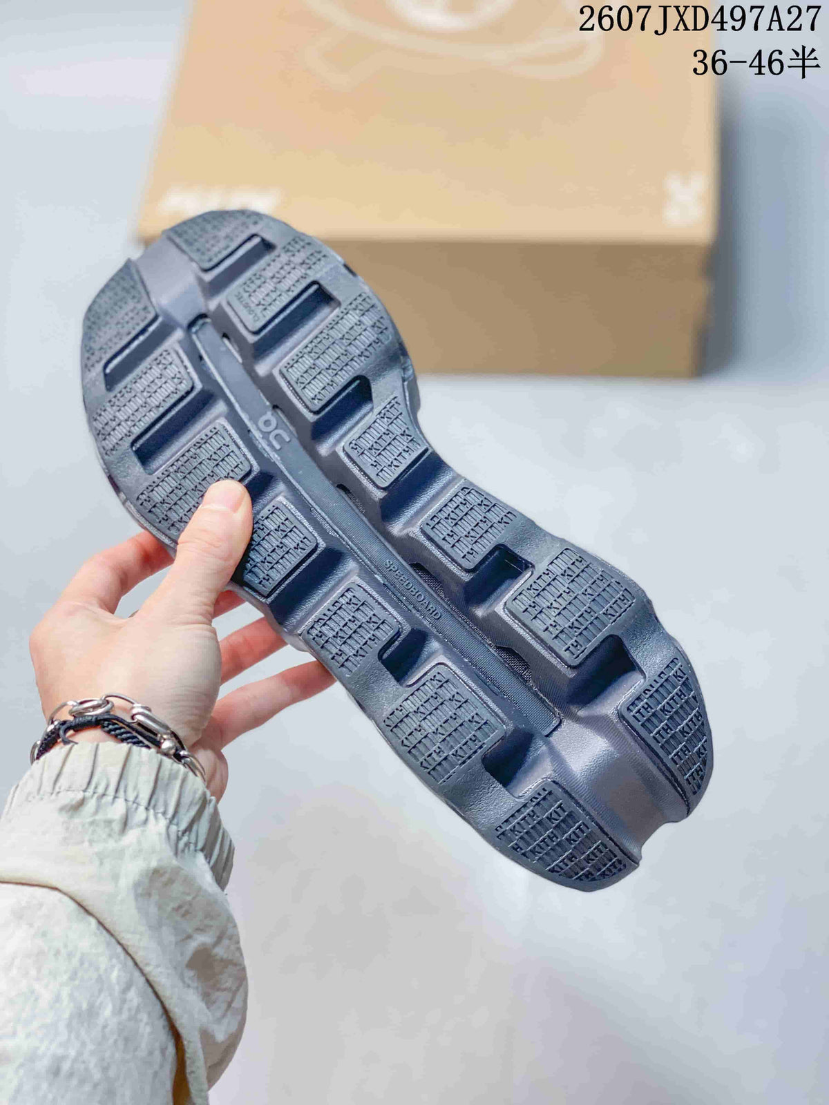 Close view of the sneaker outsole showing segmented traction panels and open channel details.