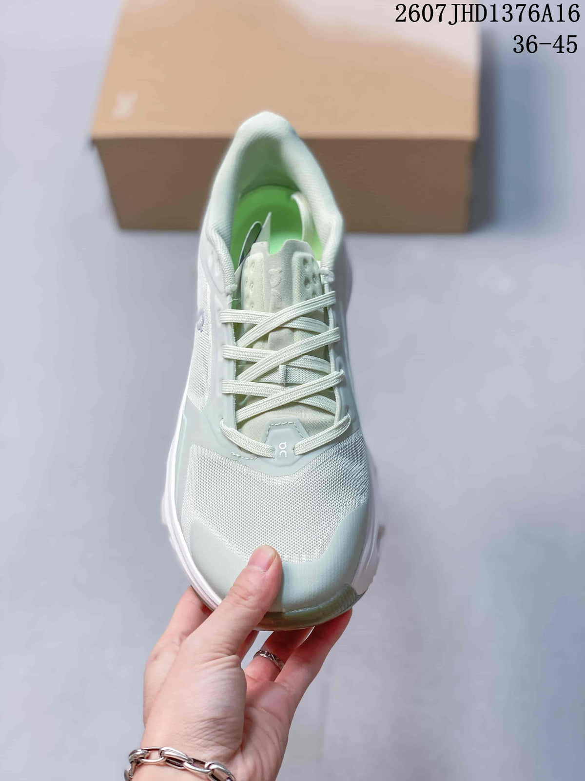 Top view of an On Cloudpulse 2 sneaker showing the mesh-style toe area, laces, padded tongue, and green interior.