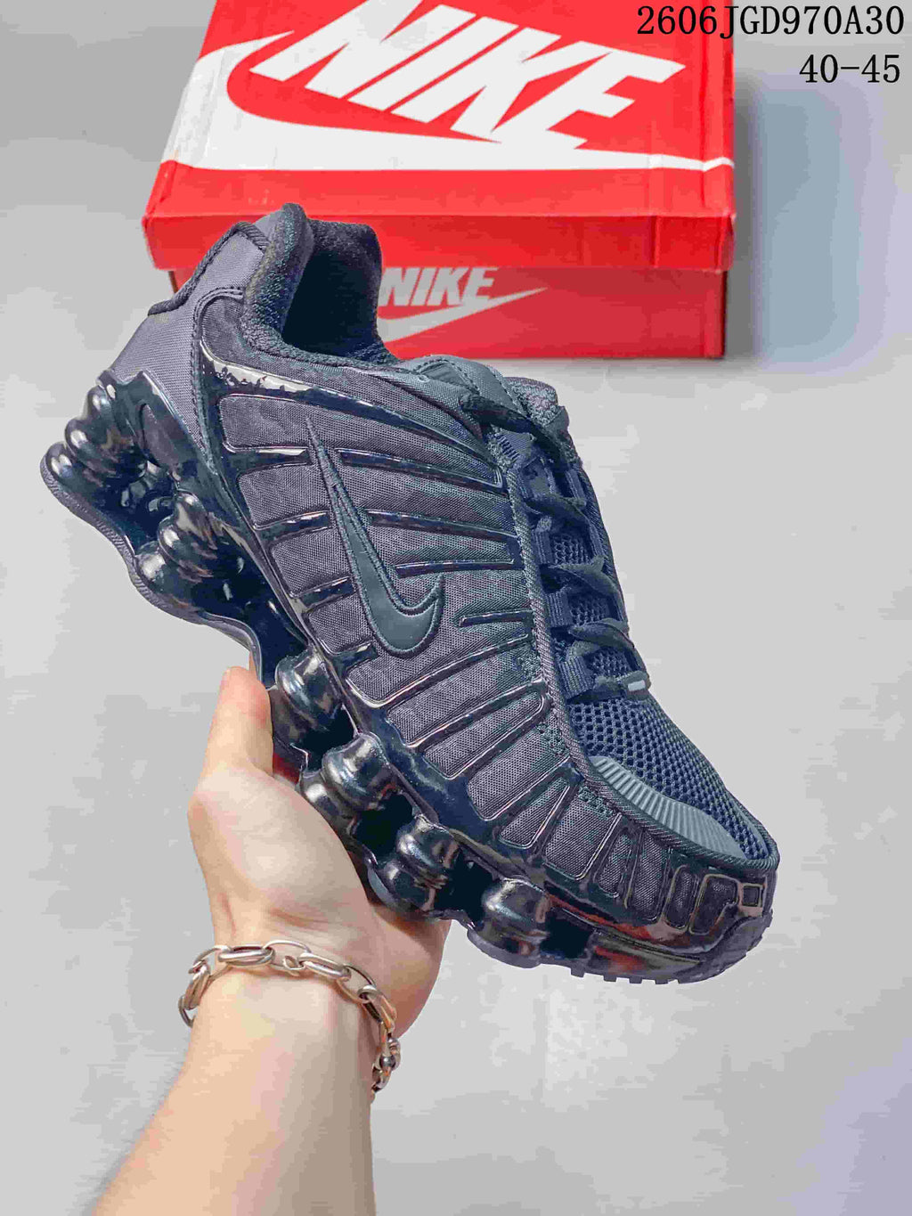 Dark Nike Shox TL sneaker with dark side panels