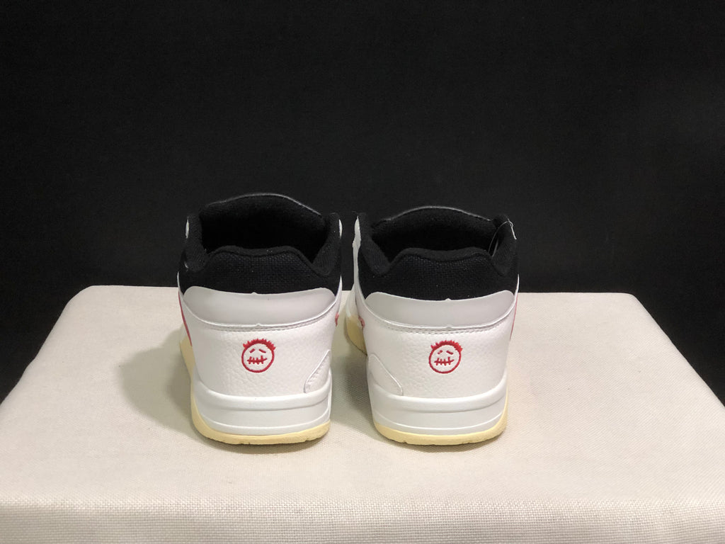 Rear view showing the black padded collars, white heel panels, and red heel graphics.