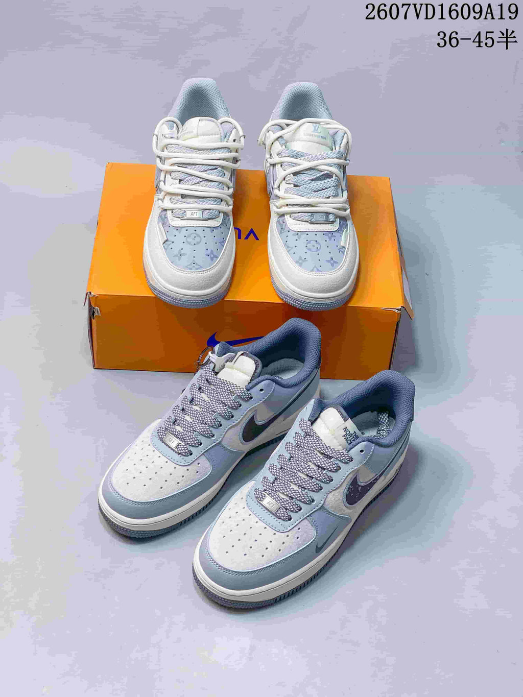 Two pairs of sneakers shown together: a gray and white Nike-branded pair in front and a white and lavender branded pair behind.