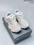 Pair of light white New Balance 9060 sneakers displayed on a New Balance shoebox; image text shows style reference 2607JGD269A19 and size range 36–45.
