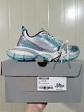 Pair of light blue, white, silver and purple mesh sneakers displayed on a shoe box; the box label shows model reference 4095 and photographed size C 37.