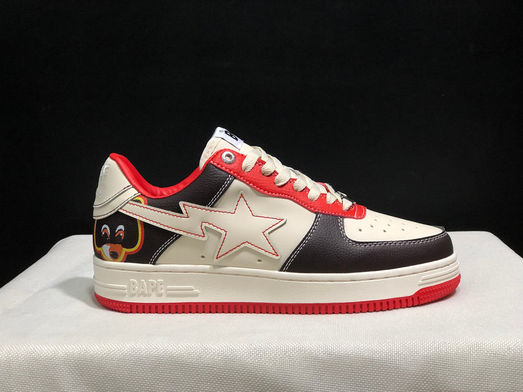 Side and heel view highlighting the star-shaped side detail, heel graphic, contrast panels, and red outsole.