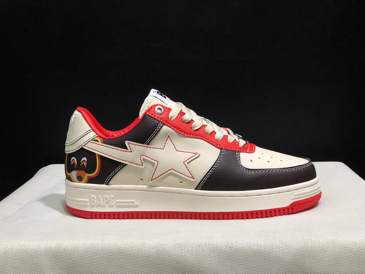 Side and heel view highlighting the star-shaped side detail, heel graphic, contrast panels, and red outsole.