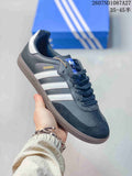 Black and white adidas Samba sneaker with white stripes, dark laces and a gum-look sole.