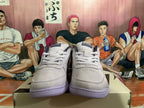 Front view of gray Nike Book 1 shoes with laces and perforated toe panels