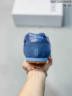 Rear view of the blue sneaker showing the padded heel, Loewe branding, and light-blue heel accent.