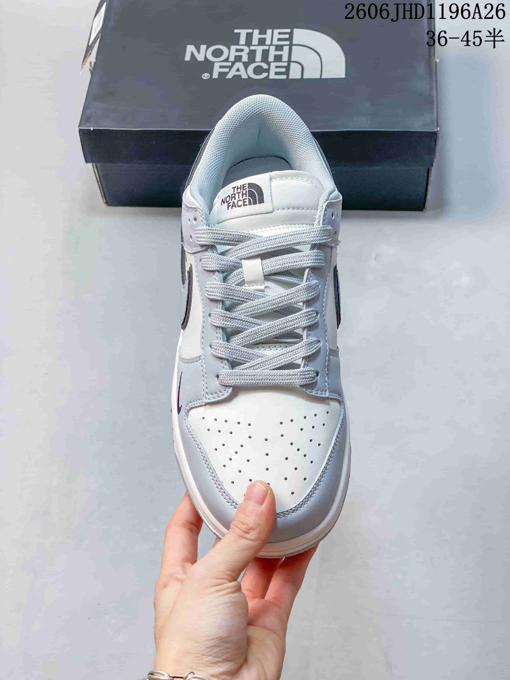 Top view of the sneaker showing its perforated toe, laces, and tongue branding.