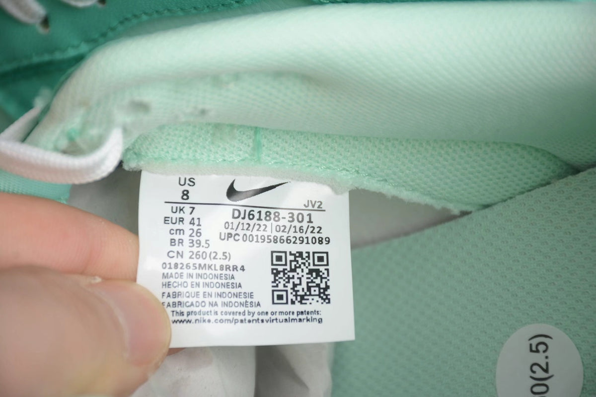 Close-up of the interior Nike size label showing US 8, UK 7, EUR 41, CM 26, and model code DJ6188-301.