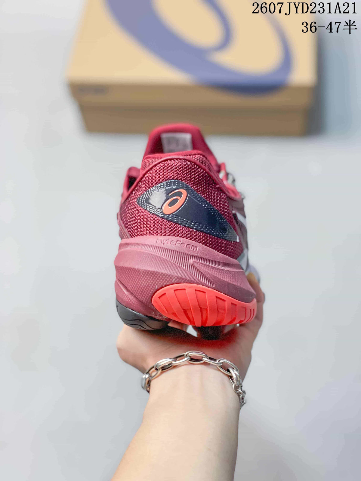 Rear view of the burgundy tennis shoe showing the padded heel, ASICS branding, and outsole detail.