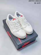 Pair of white low-top Nike Air Jordan 1 sneakers displayed on a black-and-red shoebox; overlay shows style code 2607NY1166A16 and size range 36–45.5.
