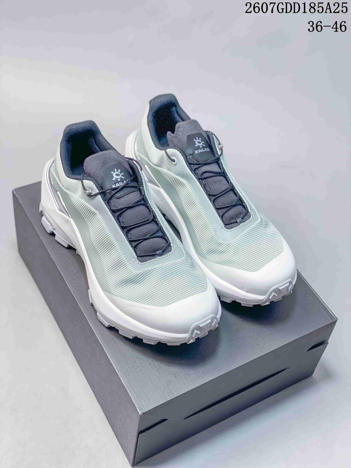 Pale mint and white KAILAS VENTO sneakers displayed on a black shoebox, with the style code and size range visible above.