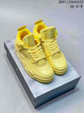 Pair of yellow high-top sneakers displayed on a shoebox, showing the front, laces, mesh panels and padded collars.