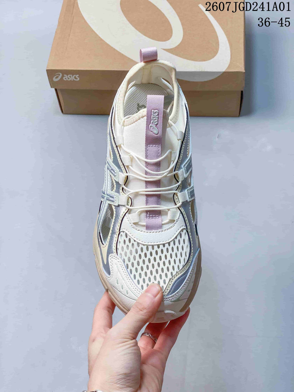 Top view showing the mesh-look toe panel, laces, and lilac tongue detail of an ASICS GT-2160 Breeze sneaker