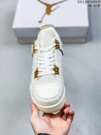Front view highlighting the white laces, mesh tongue panel, gold-tone lace hardware, and rounded toe.