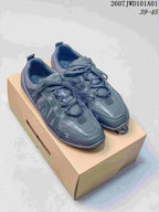 Pair of charcoal casual lace-up sneakers displayed on a box; overlay shows style code 2607JWD101A01 and size range 39–45.
