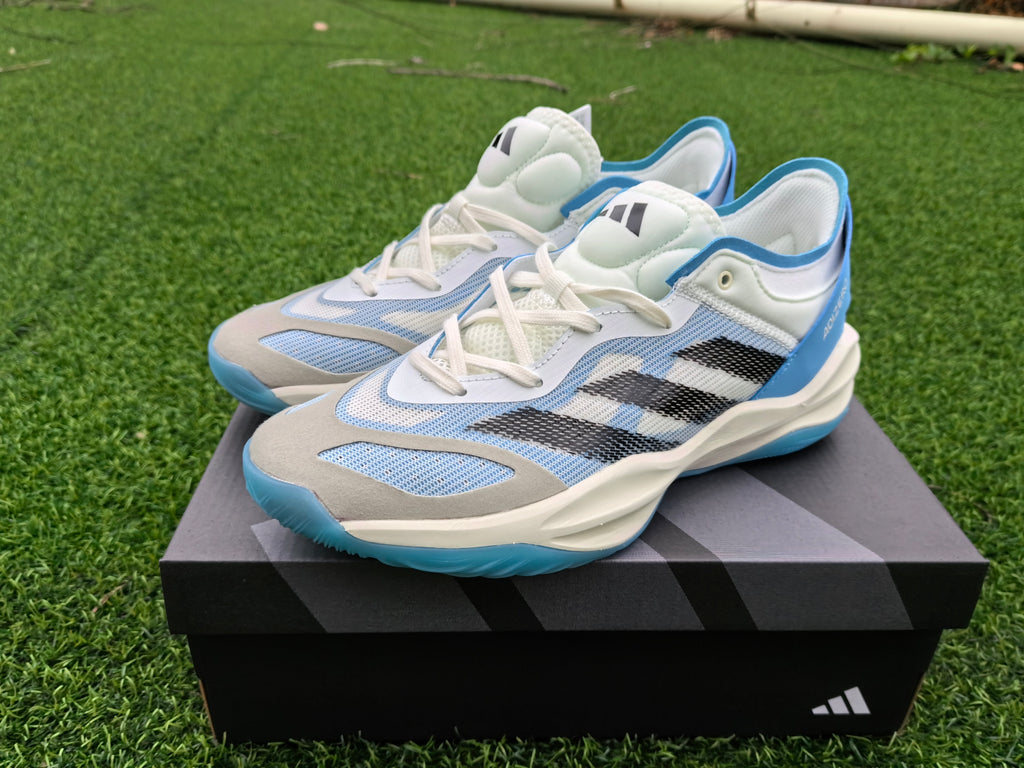 Pair of white and blue Adidas Adizero shoes shown from the front and side.