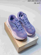 Pair of purple and pink On Cloudsurfer 3 sneakers displayed on a shoebox, with the source code and size range overlaid.