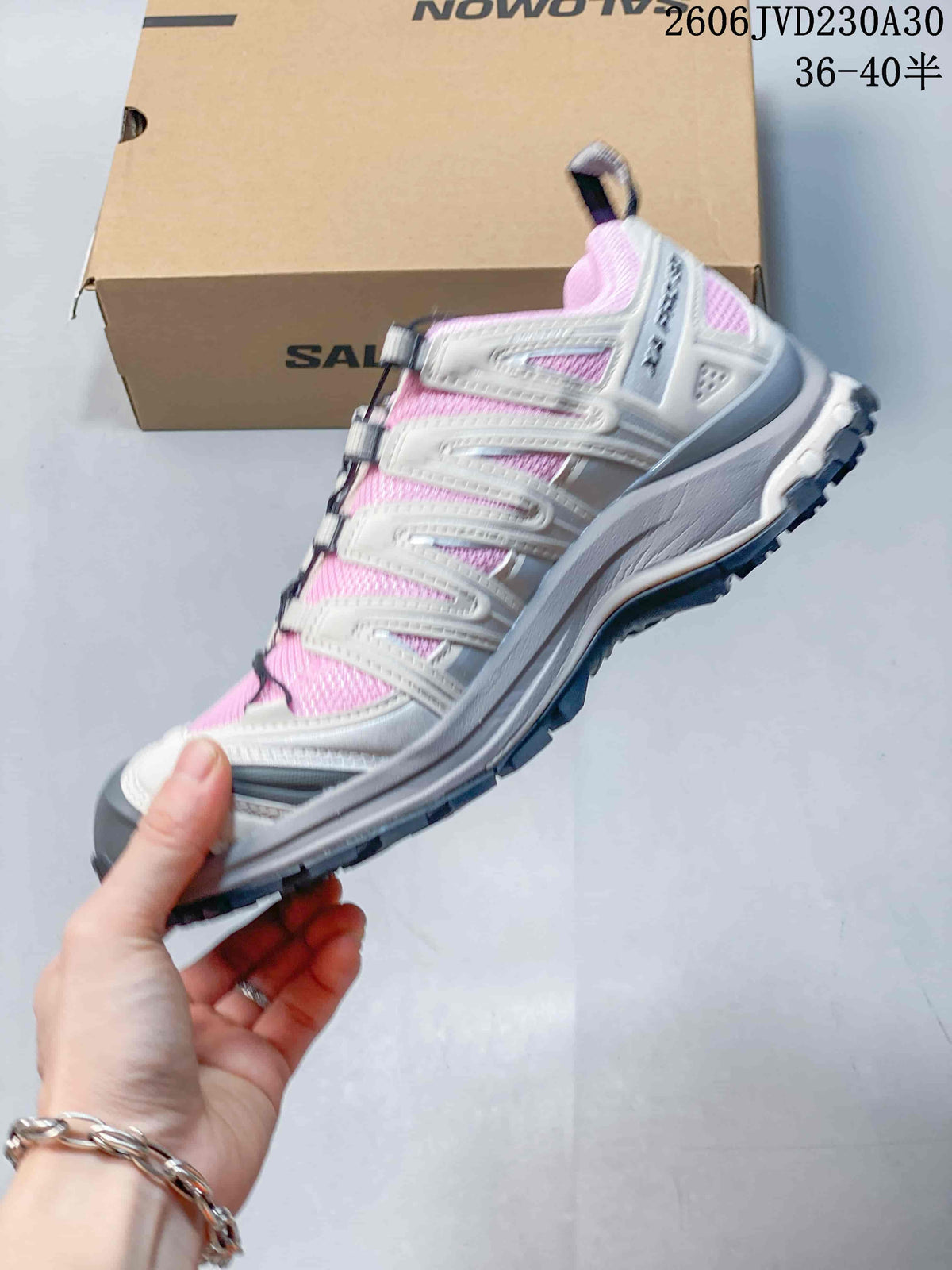 Side view showing the layered overlays and tread on the Salomon XA Pro 3D shoe
