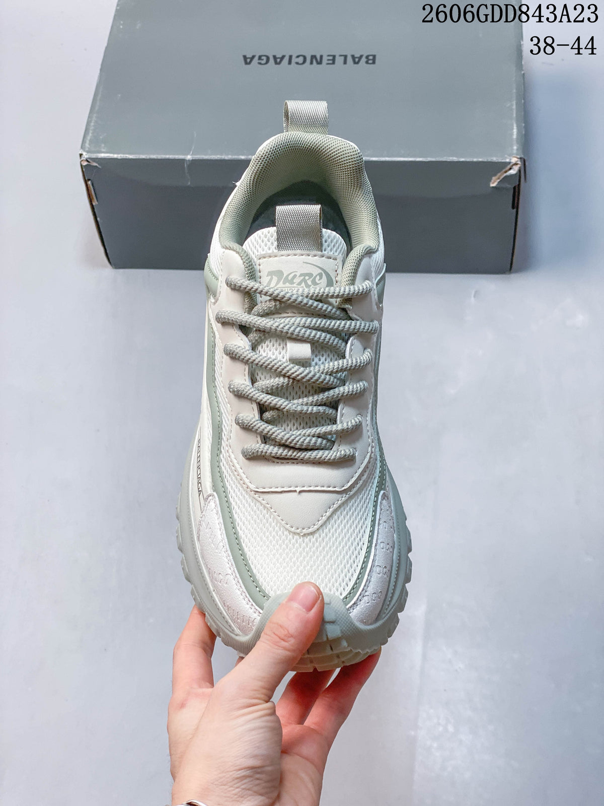 Top view of the sneaker showing its laces, mesh-look panels, and layered toe.