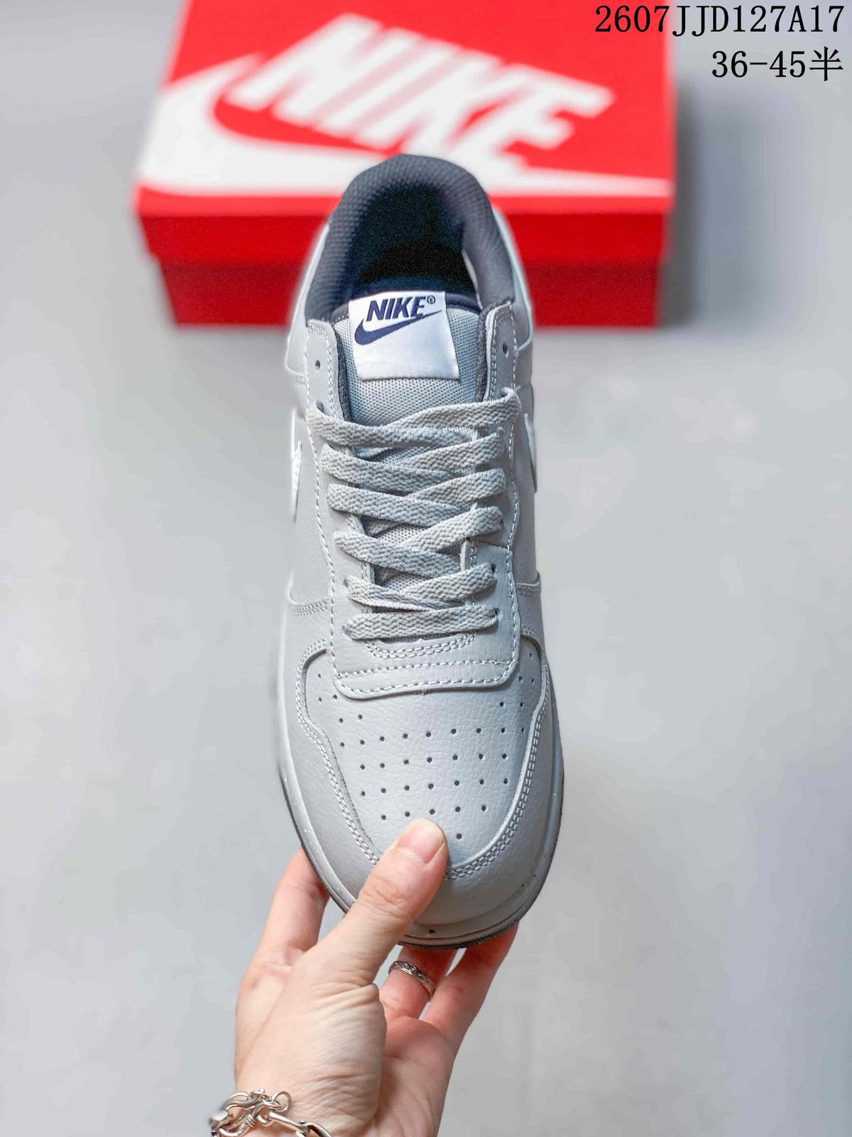 Top view showing the perforated toe box, grey laces, tongue label, and padded collar.