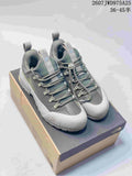 Pair of gray The North Face trail sneakers displayed on a shoebox, with model code 2607JWD975A25 and size range 36–45 shown above.