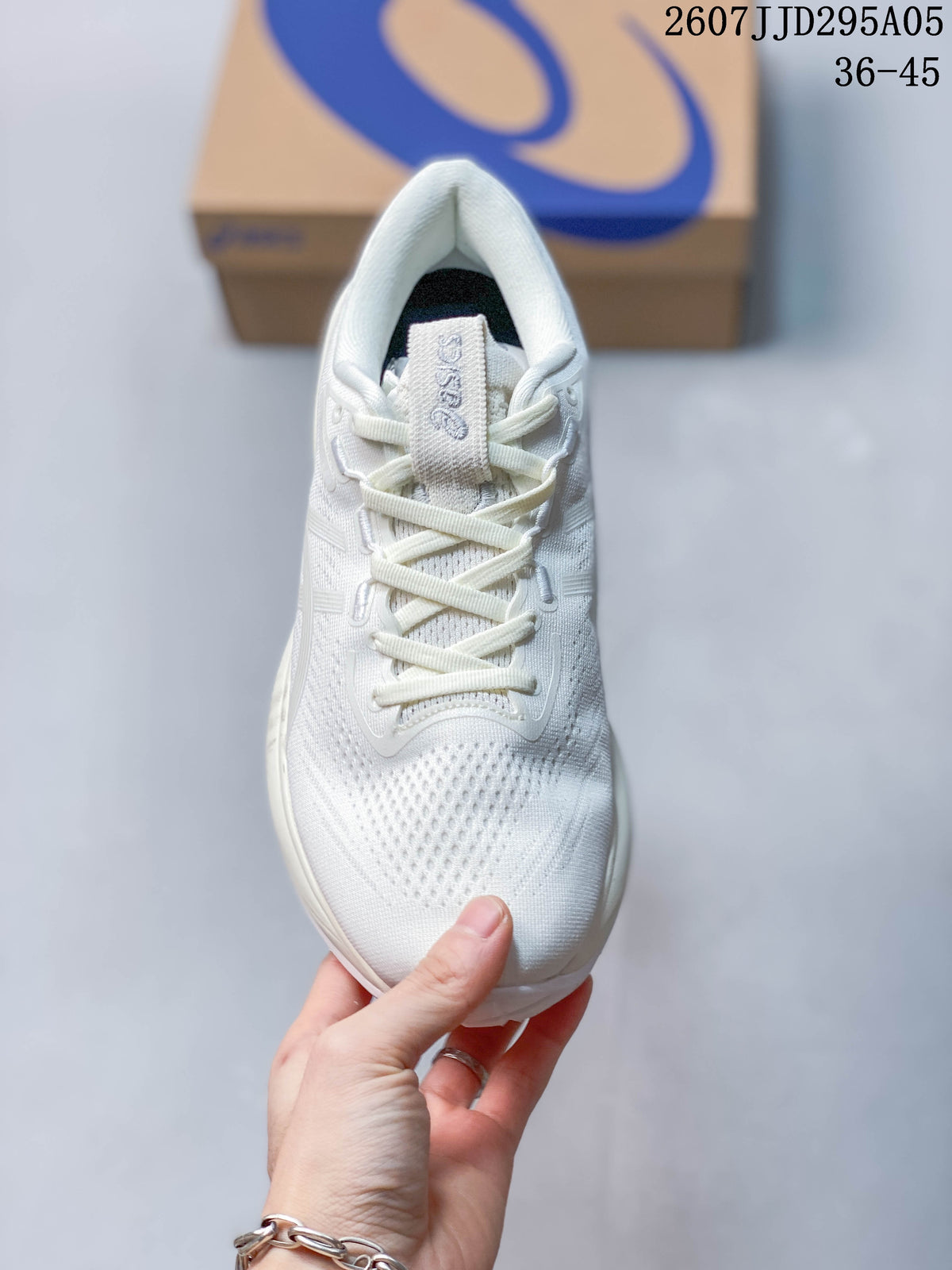 Top view of the white lace-up running shoe showing the breathable perforated toe area and tongue branding.