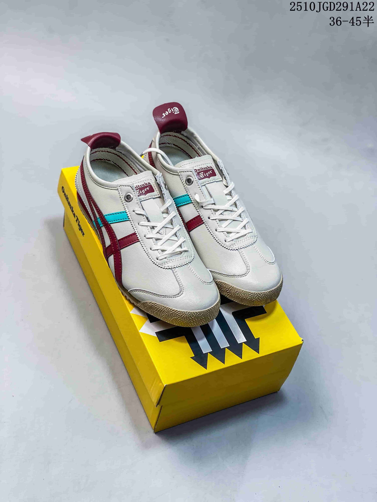 Pair of white Onitsuka Tiger sneakers with burgundy and turquoise detailing displayed on a yellow shoe box; style code 2510JGD291A22 and size range text are visible at the top right.