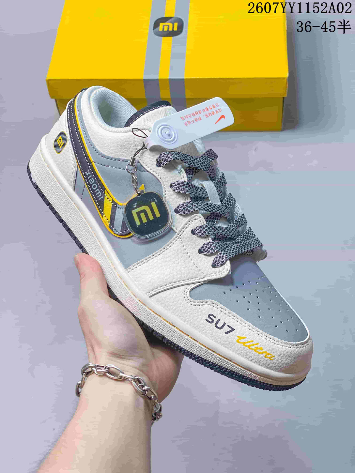 Angled view of the sneaker showing SU7 Ultra toe text and side details