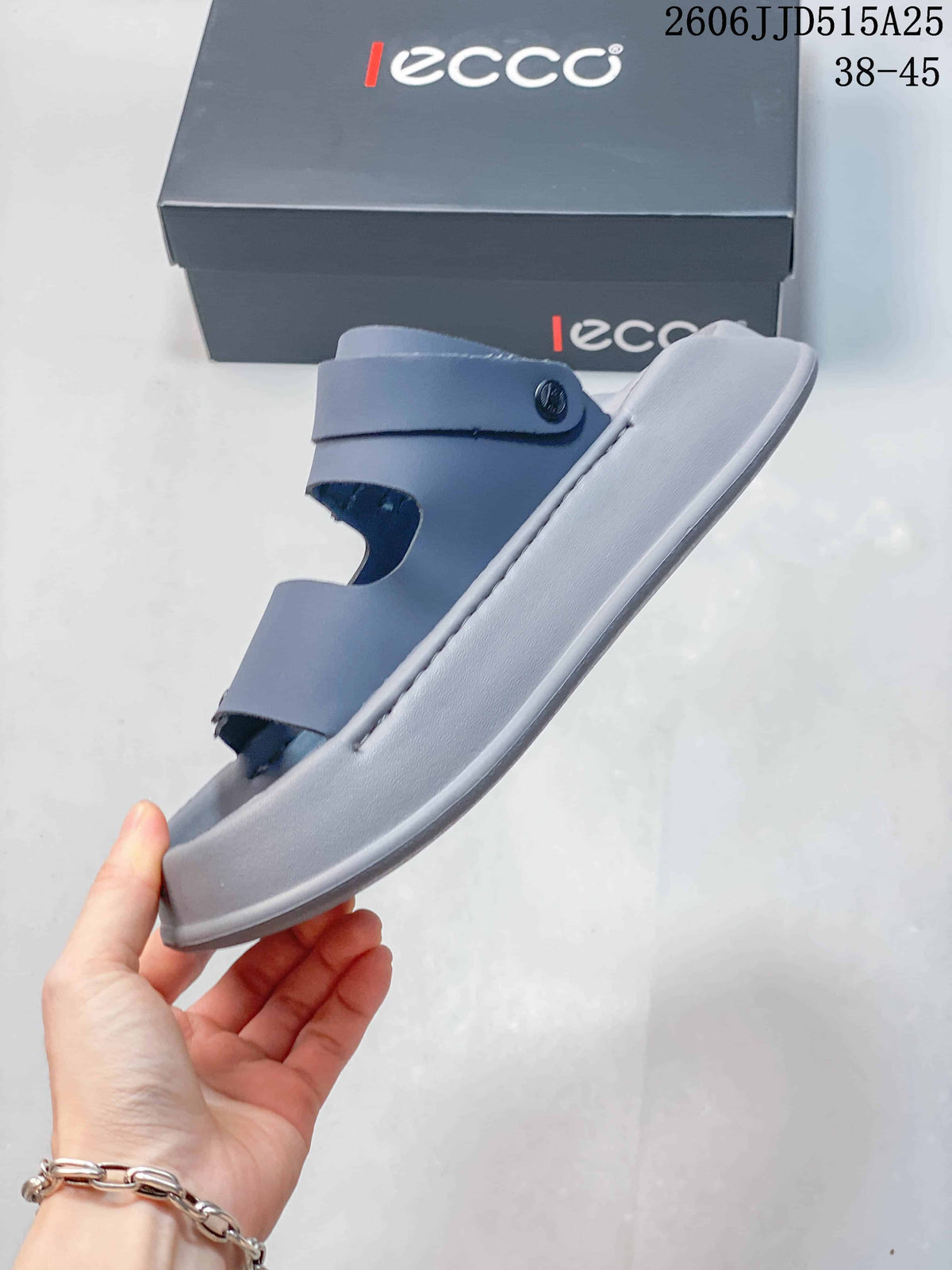Side profile of the blue-gray sandal showing the layered sole, open toe, and adjustable straps.
