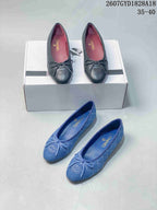 Black and blue pairs of quilted ballet flats shown together, with front bows and contrasting interior linings.
