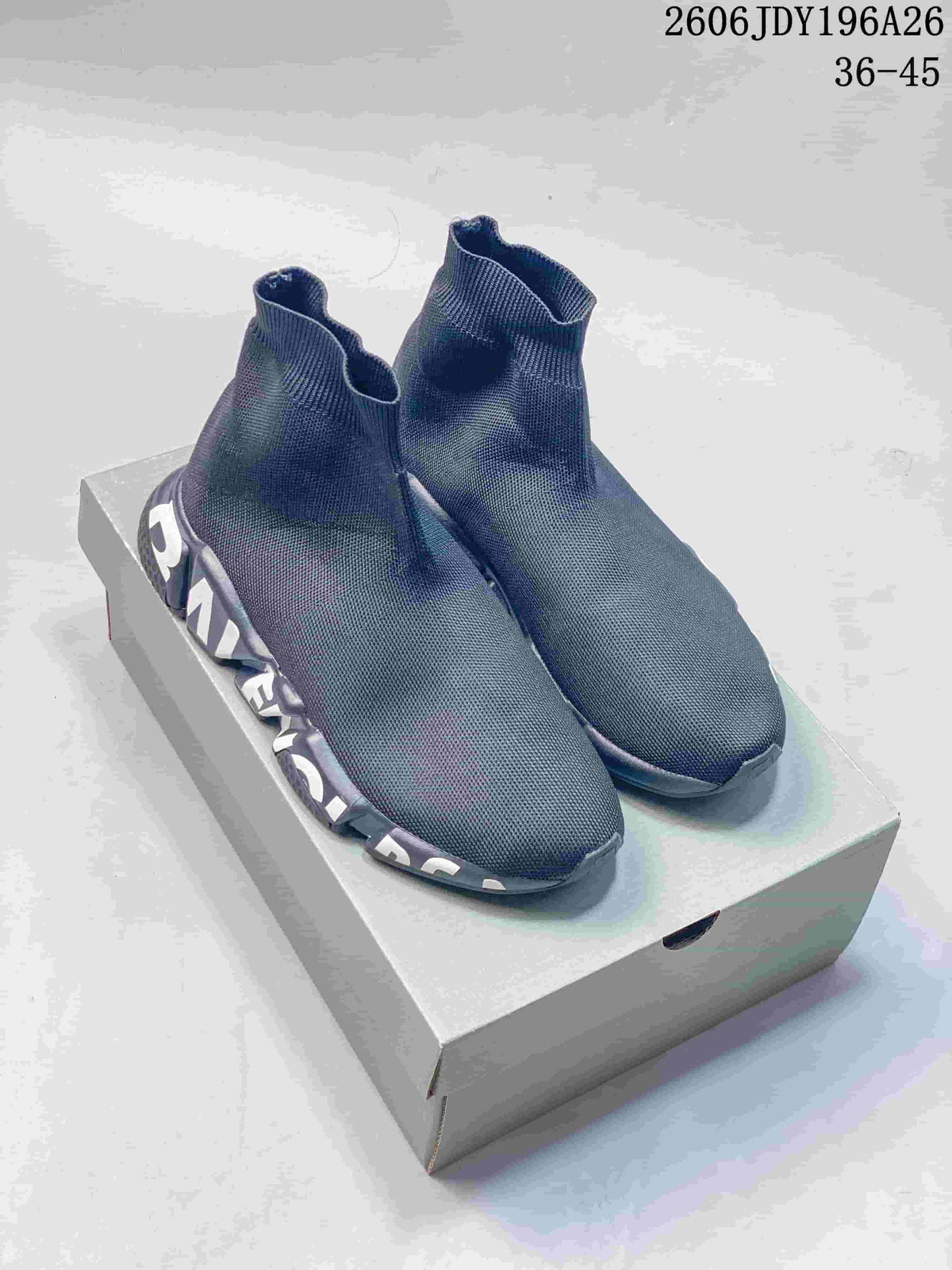 Pair of dark gray Balenciaga sock-style sneakers displayed on a shoebox, with style code 2606JDY196A26 and size range 36–45 visible above.