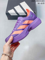Side profile showing purple upper, coral stripes and sculpted sole