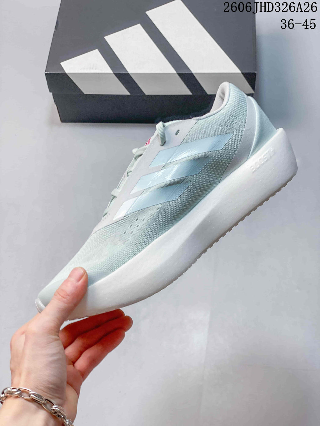Side profile of a pale blue running shoe with white midsole