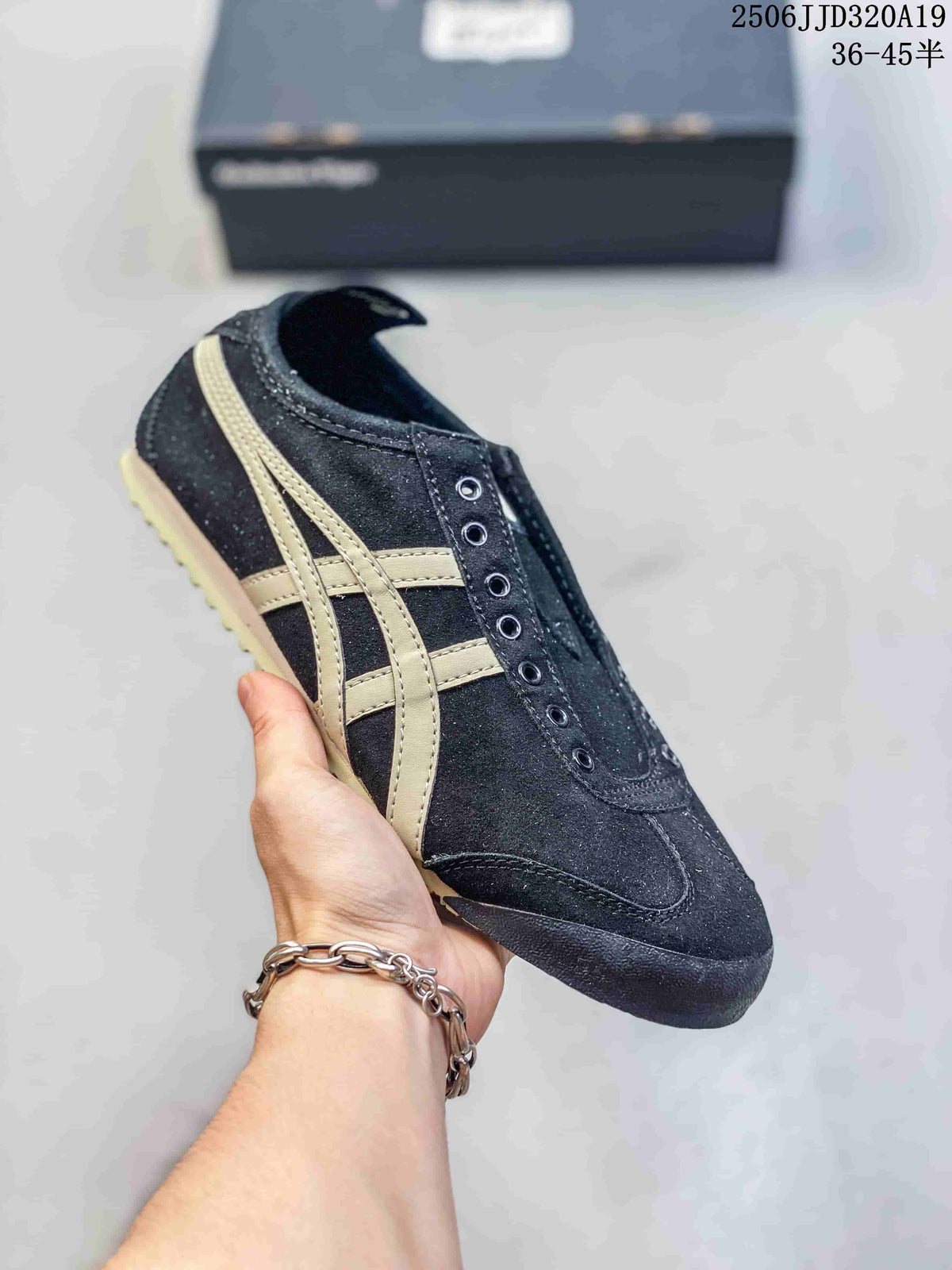 Black low-top sneaker with beige side stripes, shown without laces