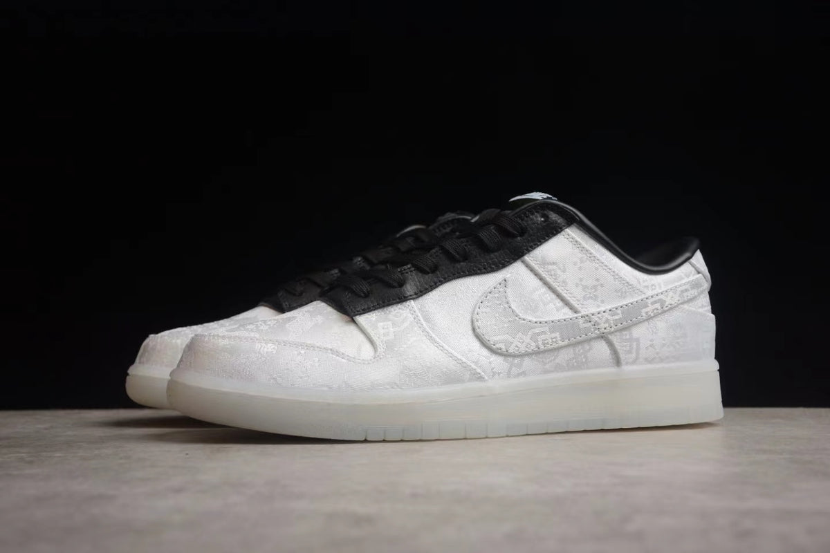 Angled side view highlighting the white patterned panels, side Swoosh, and black collar.