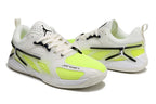 Side view of white and fluorescent lime Jordan Heir shoes