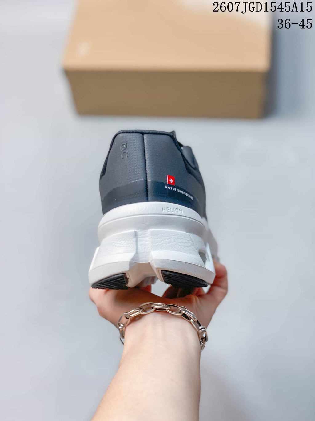 Rear view showing the padded heel, white midsole, and dark outsole sections.