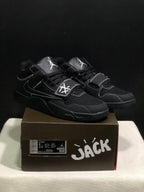 Pair of black Jordan Jumpman Jack sneakers displayed on a branded box; a size label is visible on the box.