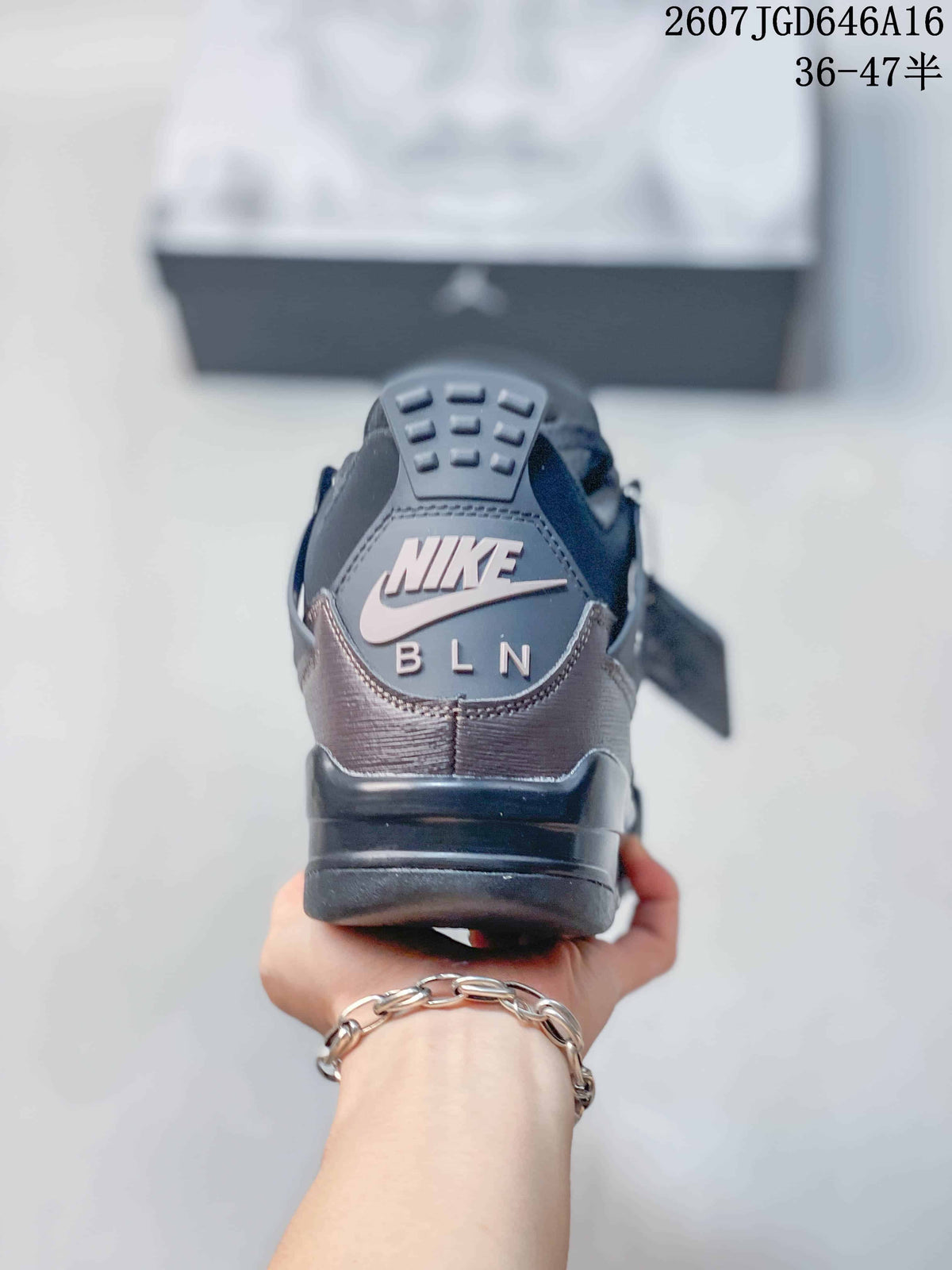 Rear view showing the heel branding, layered heel panel, and padded collar.