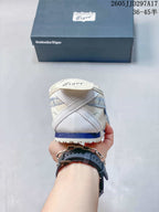 Rear view of the sneaker showing the layered heel, blue heel accent and branded heel tab; JJD297A17 and the size range 36–45.5 are visible.