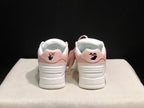 Rear view showing the padded heel panels, black heel graphics, and white outsole.