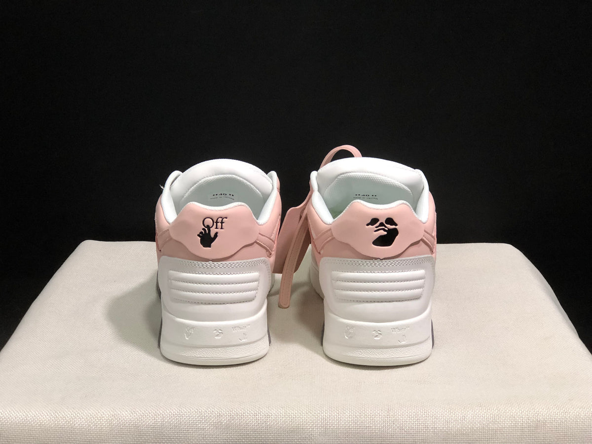 Rear view showing the padded heel panels, black heel graphics, and white outsole.