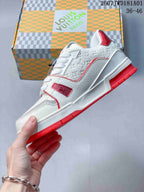 Side view showing the white textured upper, red trim, and red outsole