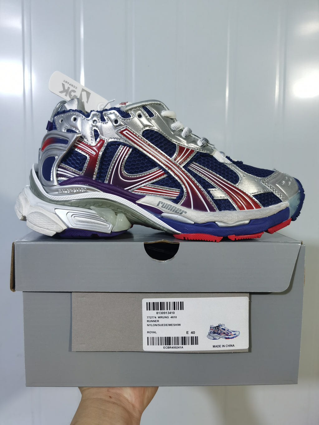 Balenciaga Runner sneaker displayed on its box; the label shows style 4610, color Royal and size E 40.