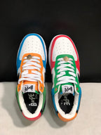 Top view showing white perforated toe boxes, colorful overlays, white laces, and branded insoles.