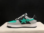 Side profile highlighting the turquoise star emblem, grey textured overlays and black outsole.