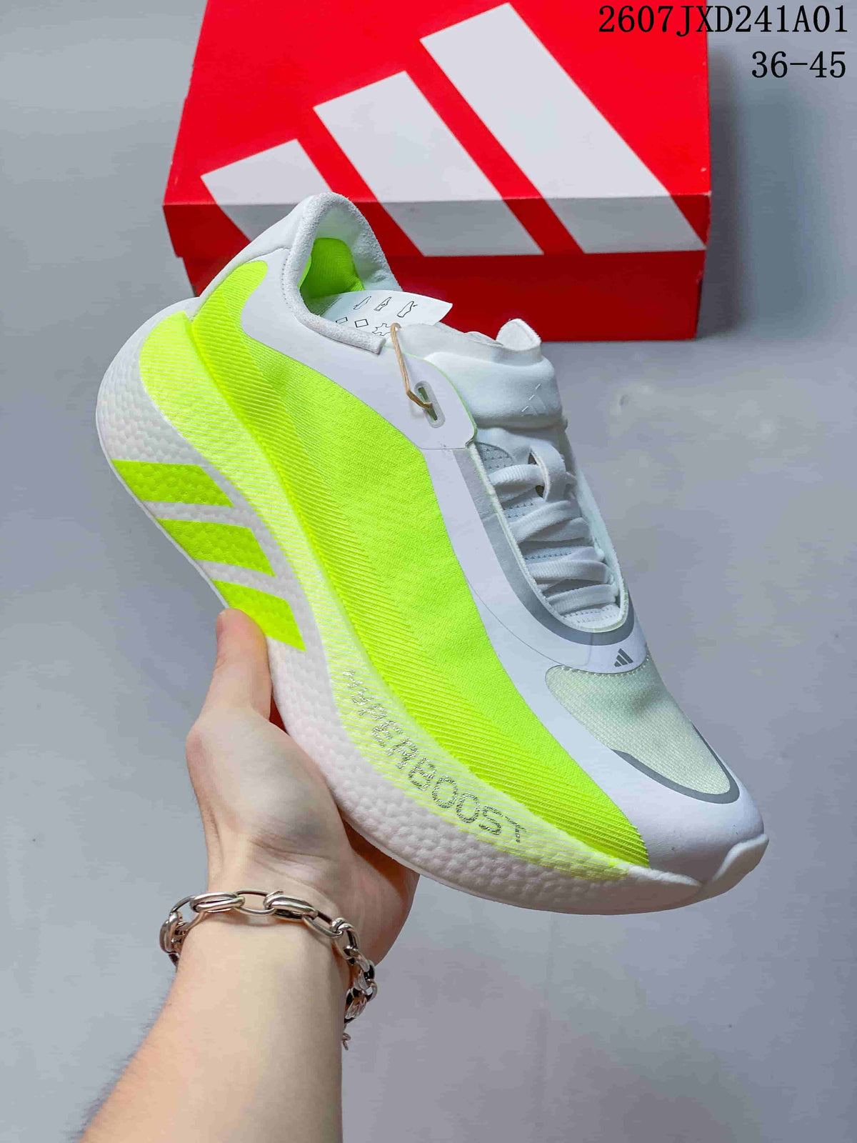 Angled side view of the white and neon-yellow running shoe with adidas branding.