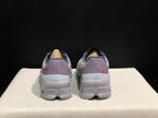 Rear view showing purple-gray heel panels on the On Cloud X sneakers